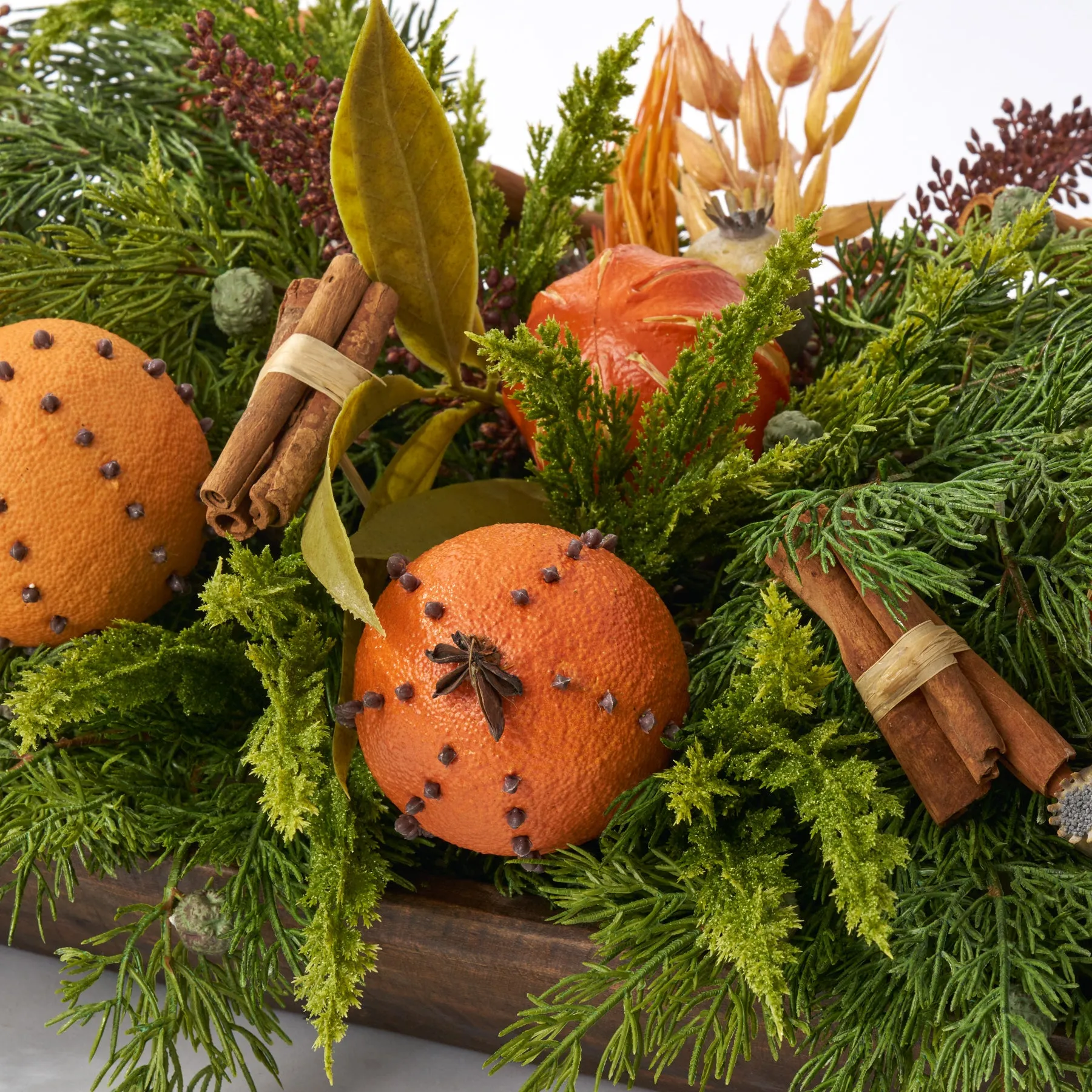 Citrus Spice - Clove Oranges, Cinnamon Stick, Juniper & Needle Eucalyptus Williamsburg Style Large Centerpiece Arrangement in Large Wood Dough Bowl